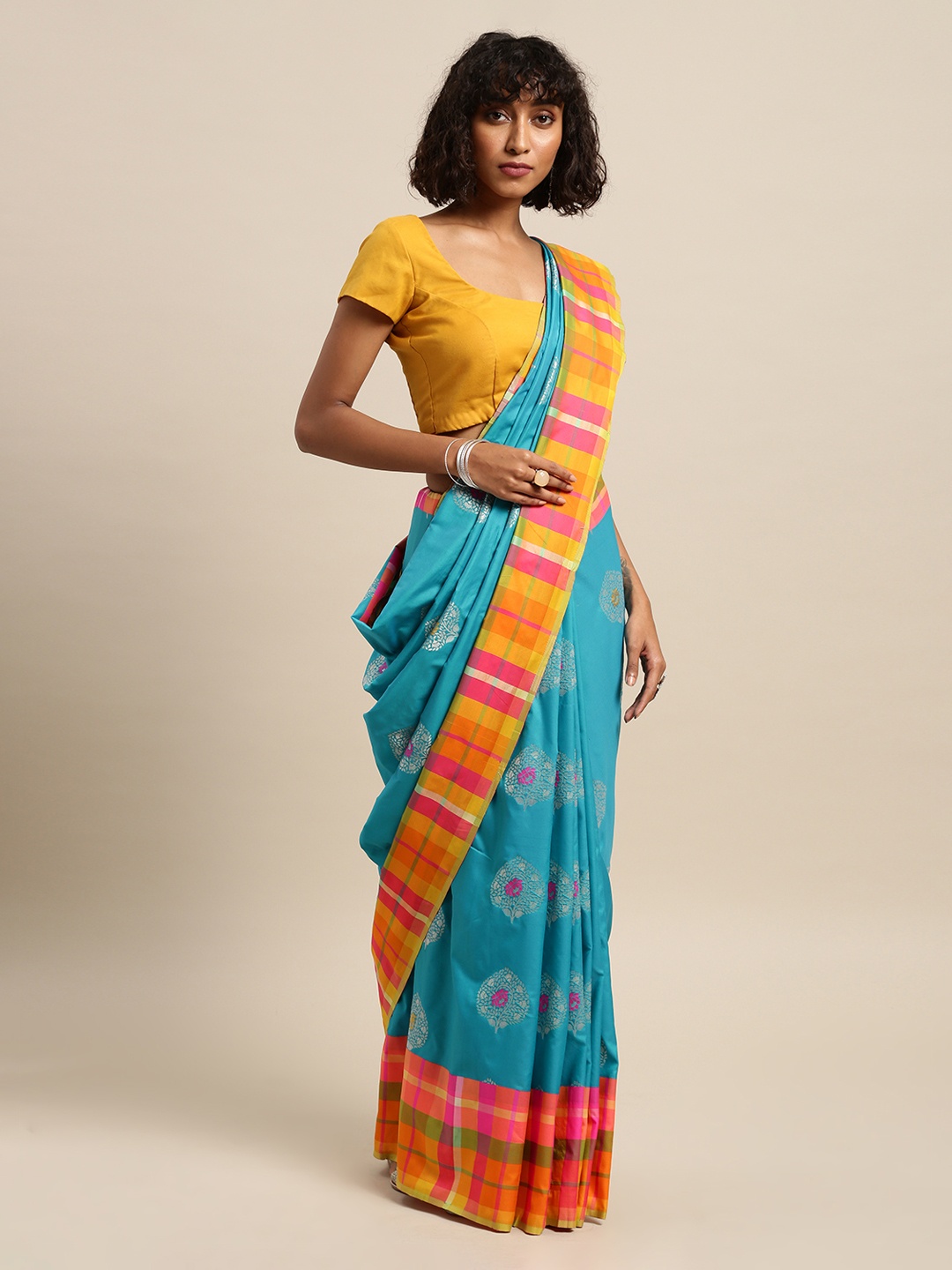 

Mitera Turquoise Blue & Orange Silk Blend Woven Design Kanjeevaram Saree