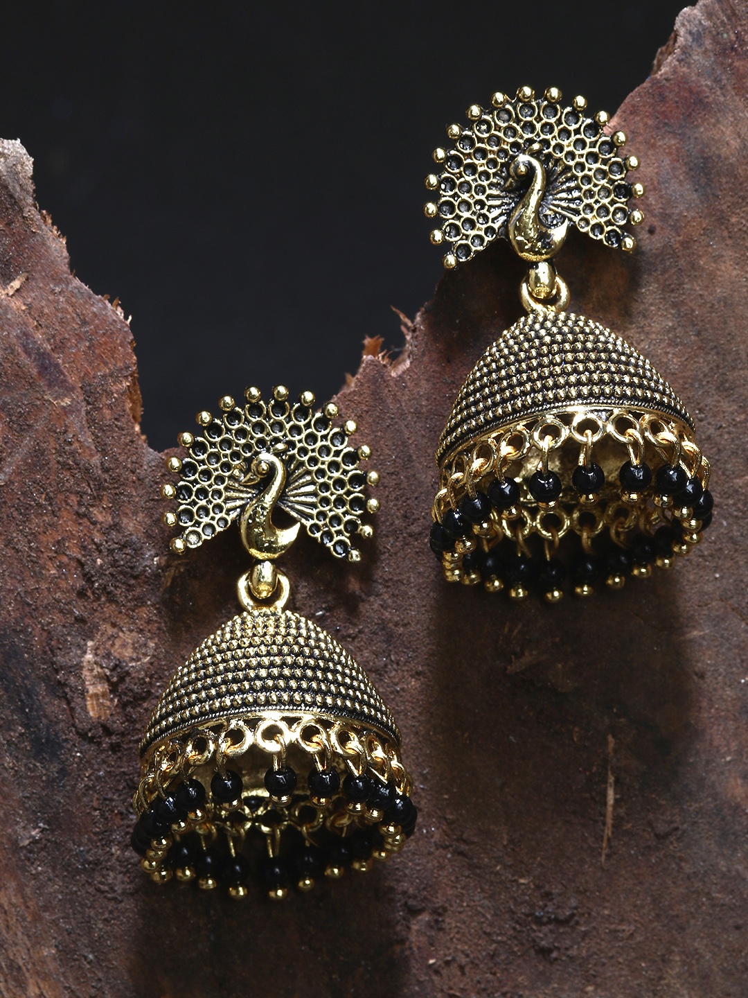

ANIKAS CREATIOn Gold Plated & Black Enamelled Peacock Shaped Jhumkas