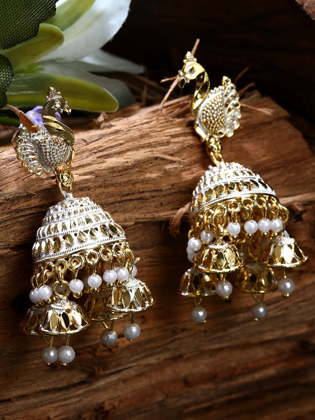 

ANIKAS CREATION Gold plated White Peacock Shaped Enamelled Jhumkas