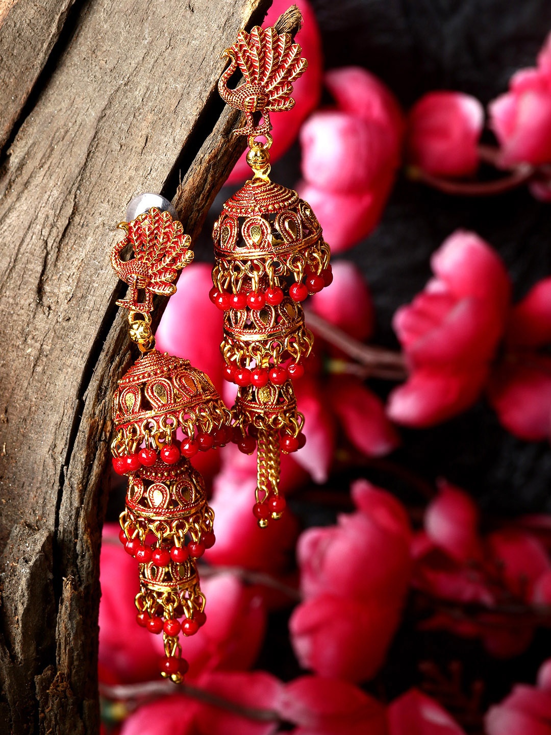 

ANIKAS CREATIOn Gold Plated & Red Enamelled Peacock Shaped Jhumkas