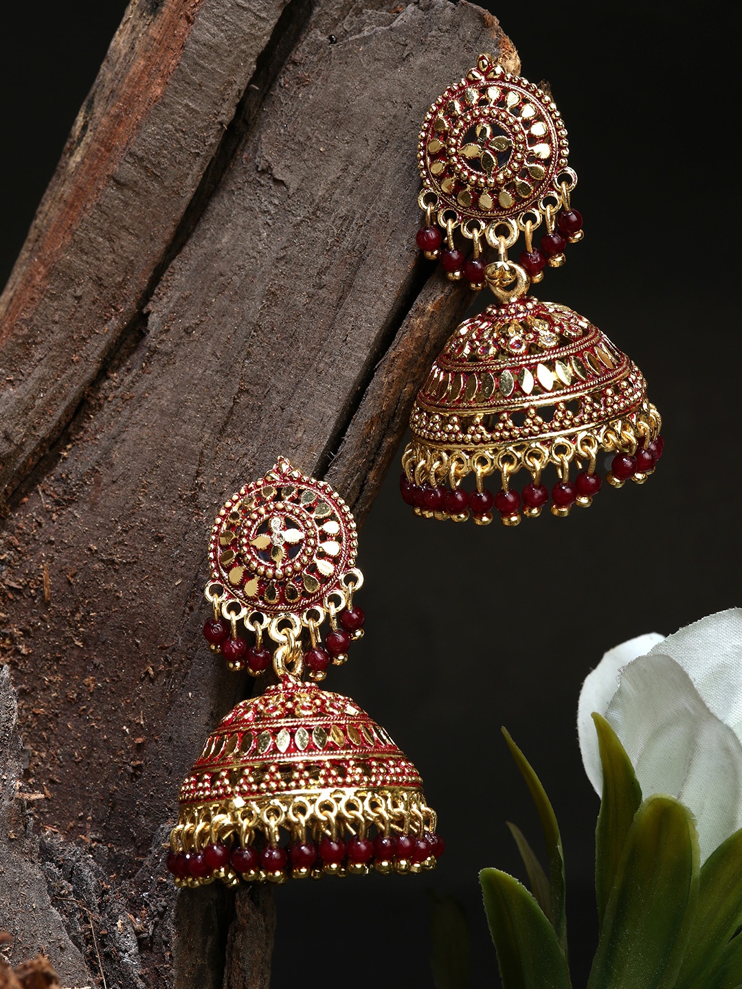 

ANIKAS CREATION Gold plated & Maroon Dome Shaped Enamelled Jhumkas