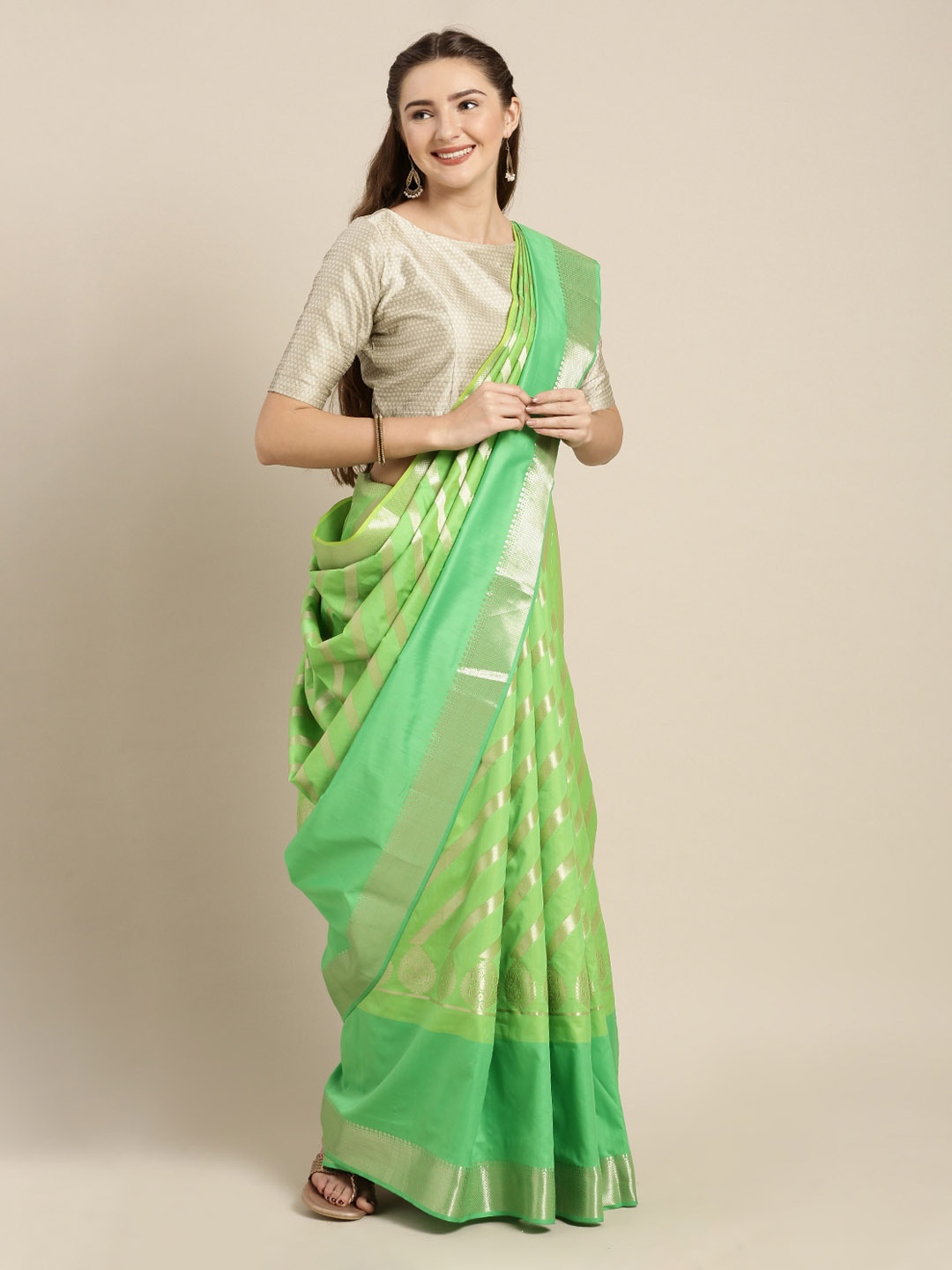 

Mitera Green Silk Blend Woven Design Kanjeevaram Saree