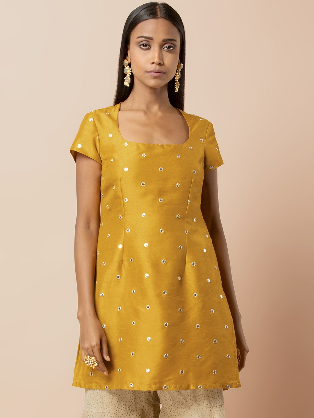 

Indya Women Mustard Yellow & Beige Embellished Kurti