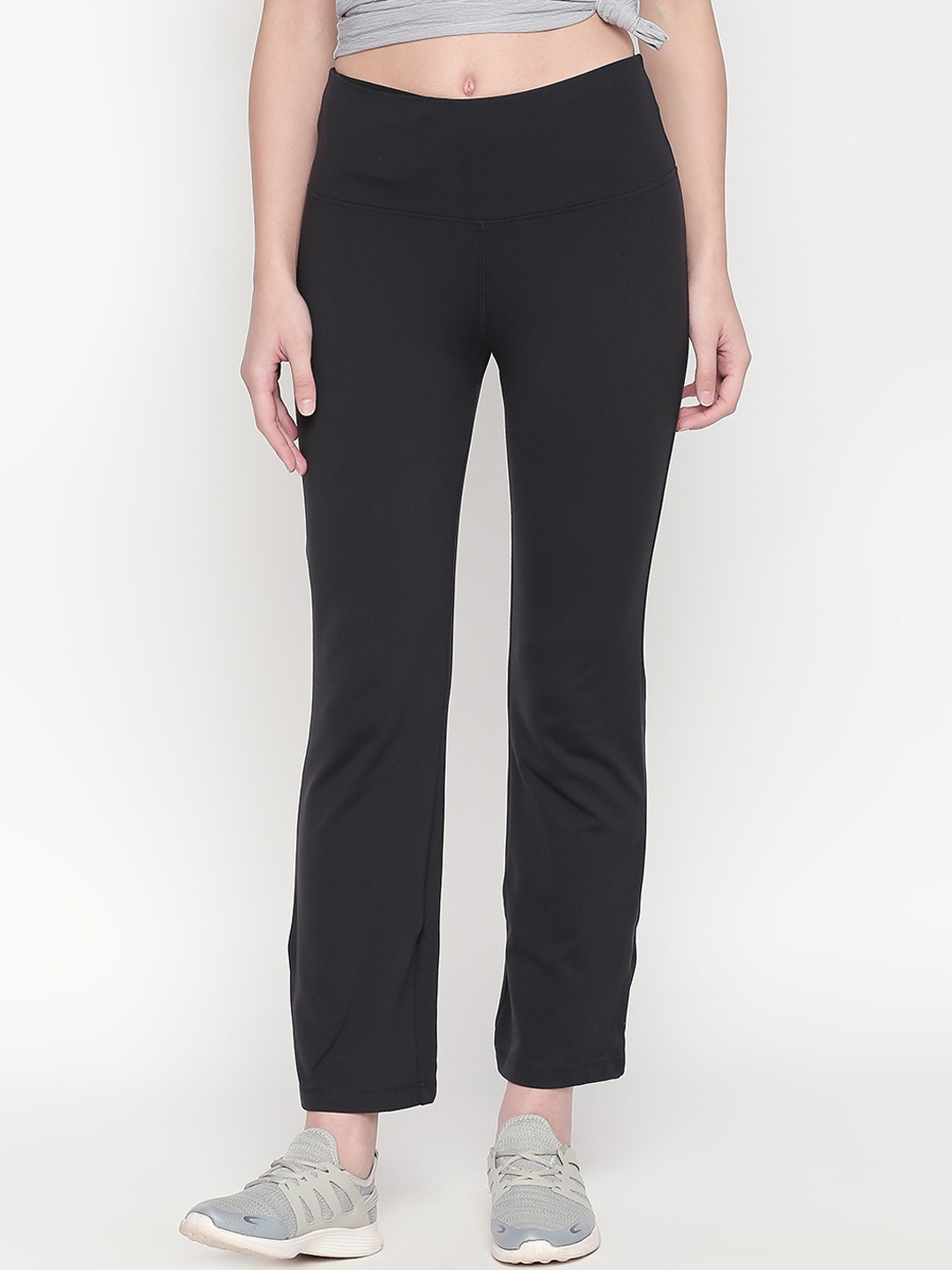 

Tuna London Women Black Solid Bootcut Track Pants