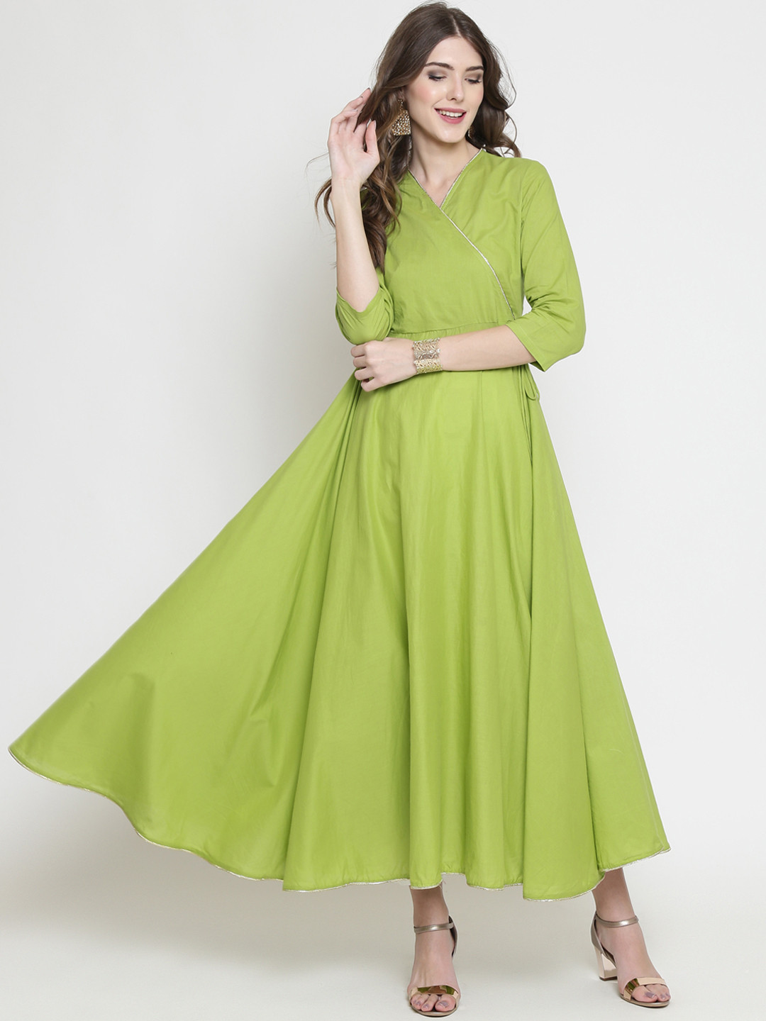 

Sera Women Green & White Solid Kurta with Palazzos