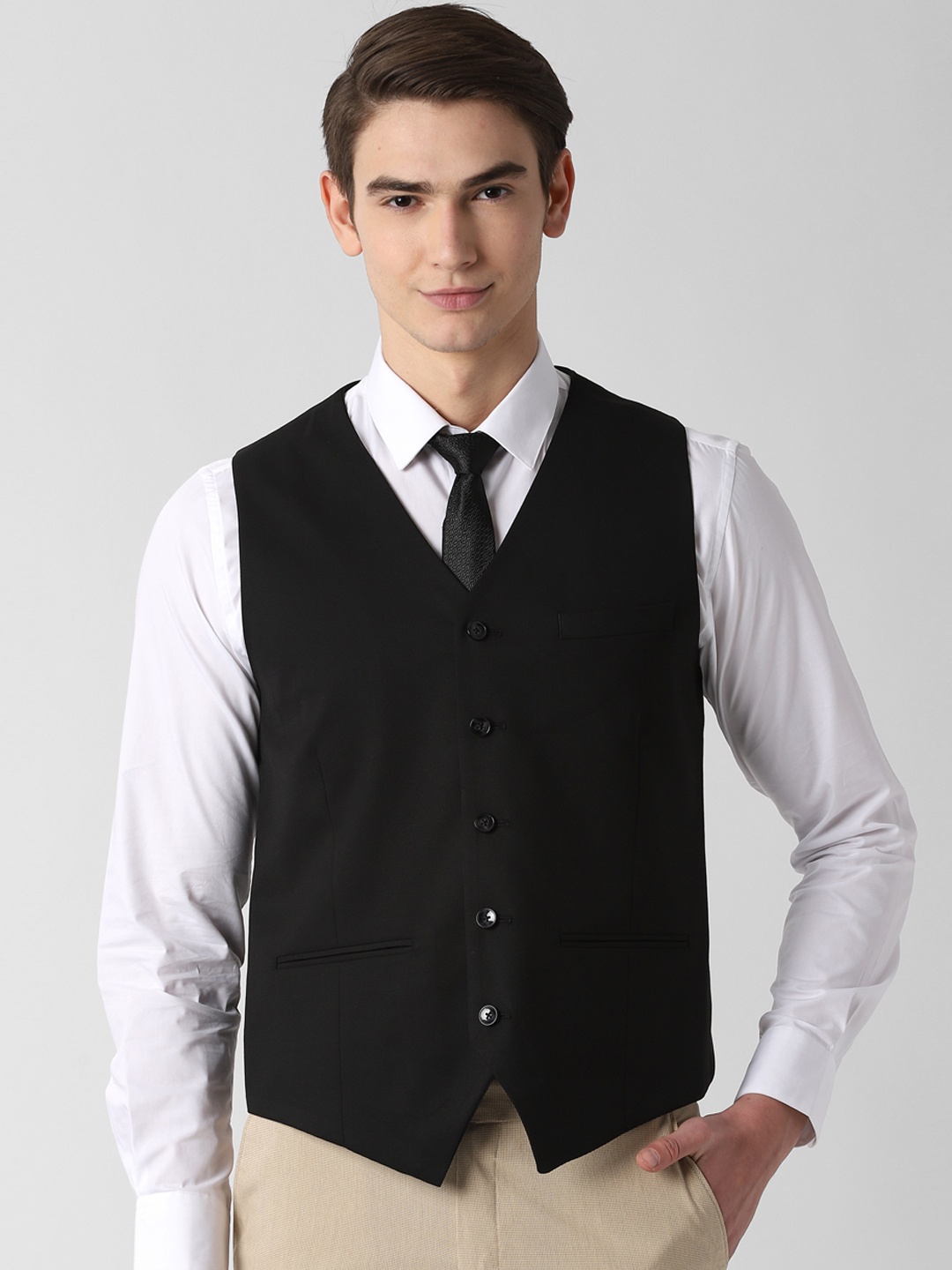 

Peter England Men Black Solid Waistcoat