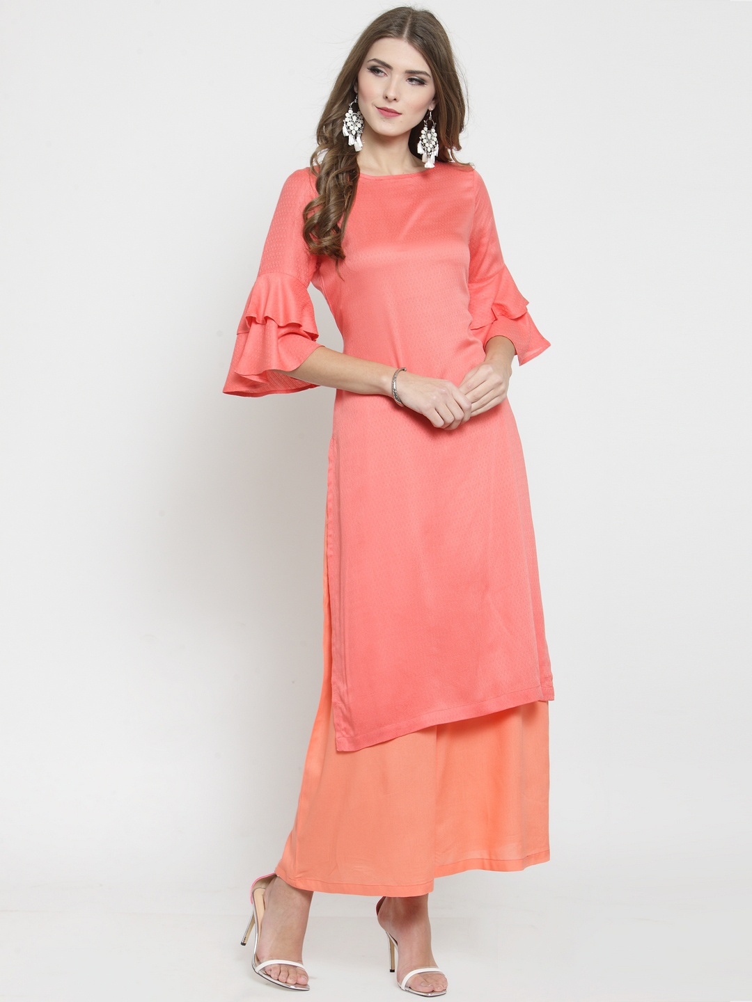 

Sera Women Coral Pink Solid Kurta with Palazzos