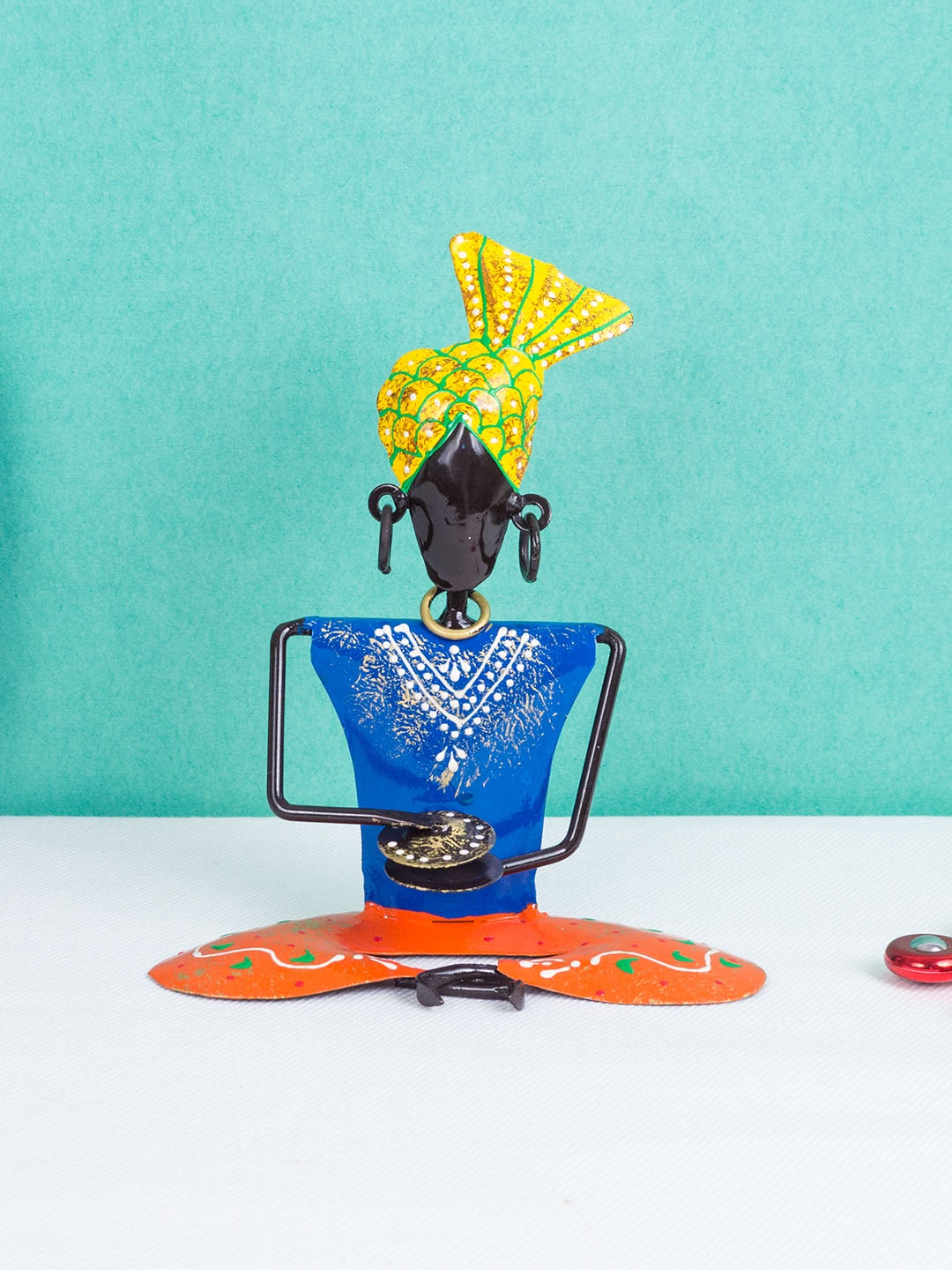 

Golden Peacock Blue & Orange Iron Handcrafted Musicians Showpieces