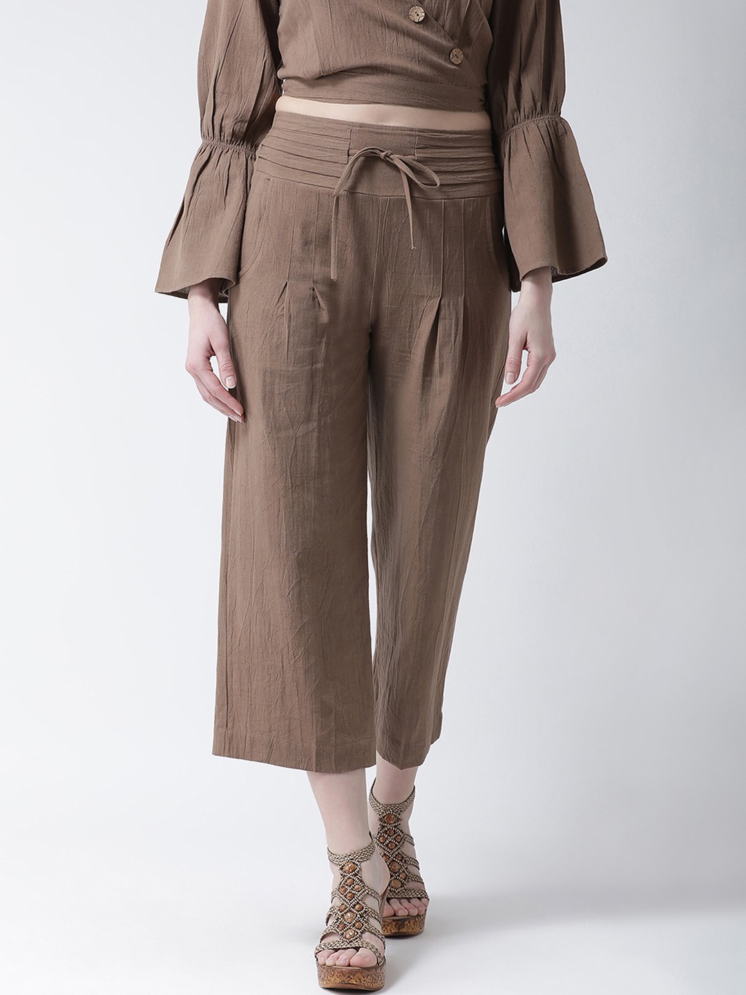 

KASSUALLY Women Brown Regular Fit Solid Parallel Trousers