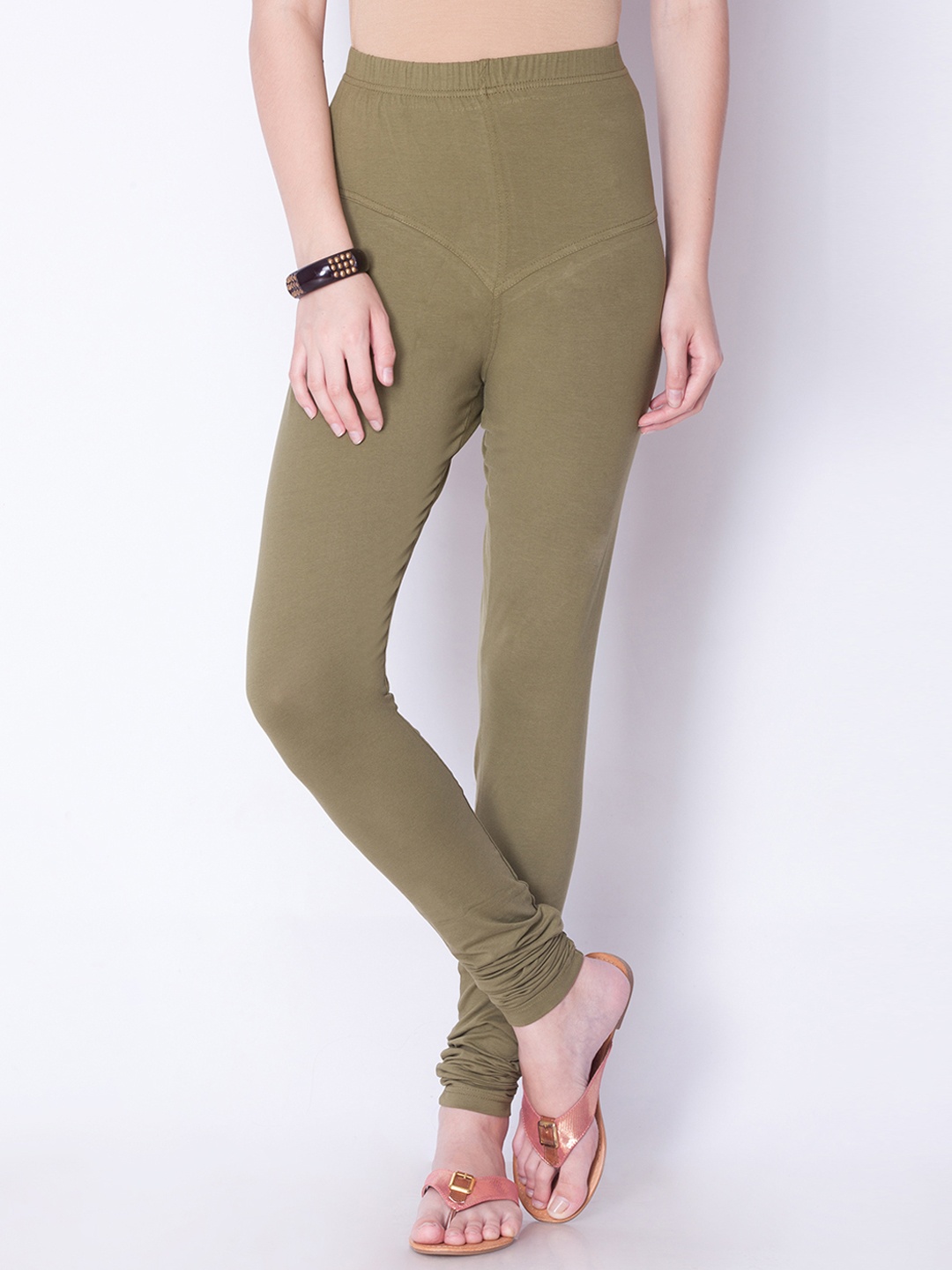 

Dollar Missy Women Olive Green Solid Churidar Length Leggings