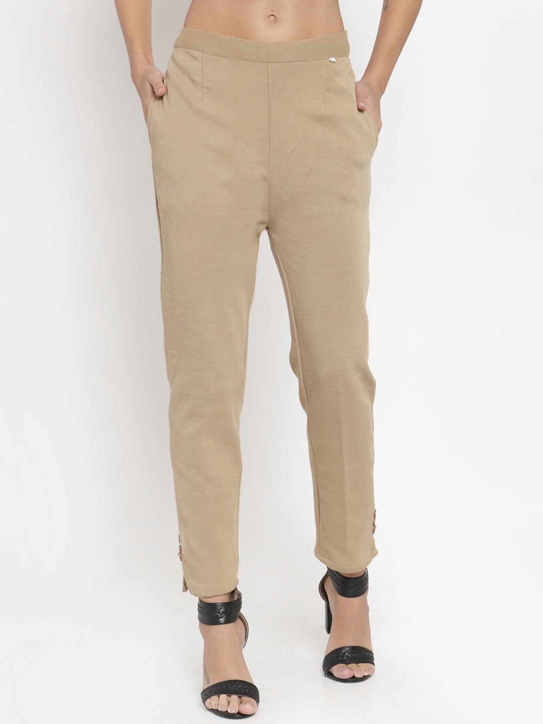 

Clora Creation Women Beige Solid Cropped Woollen Trousers