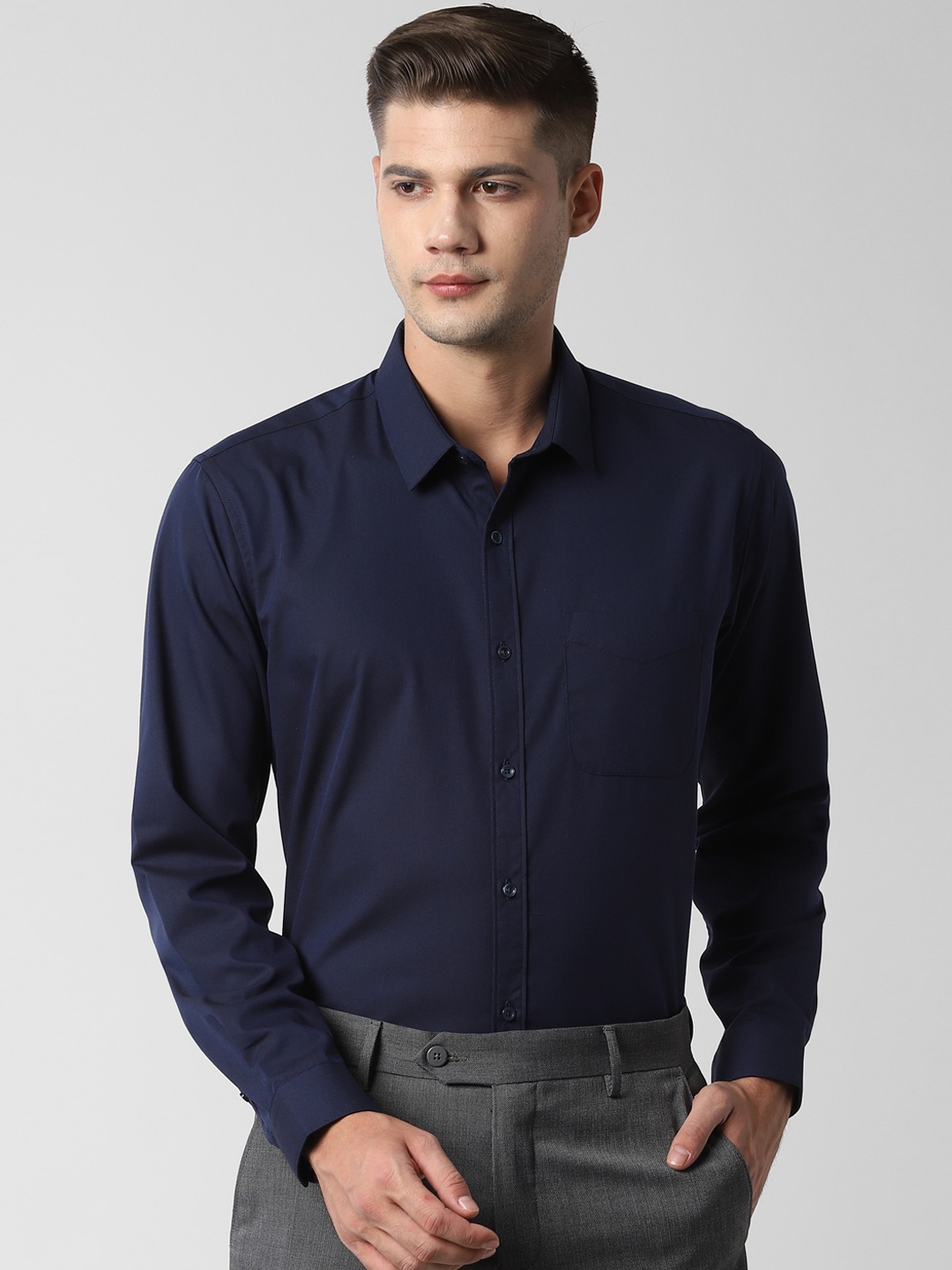 

Peter England Men Navy Blue Regular Fit Solid Formal Shirt