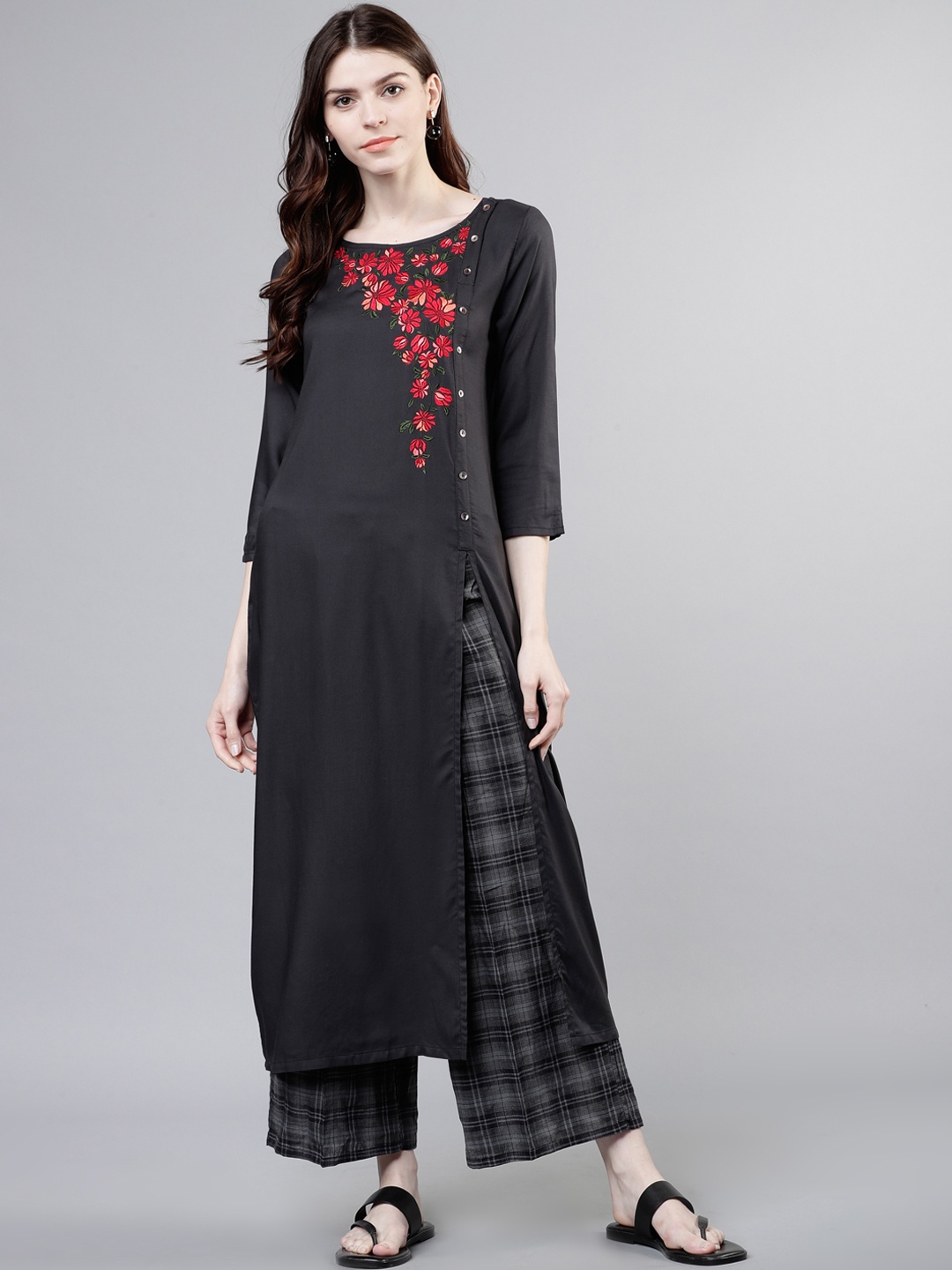 

Vishudh Women Black & Red Solid Kurta with Palazzos