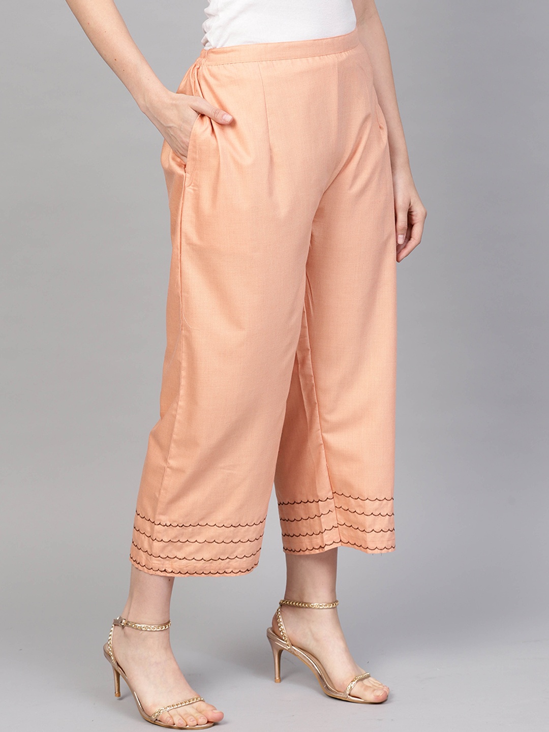 

Indo Era Women Peach-Coloured Hem Design Straight Palazzos