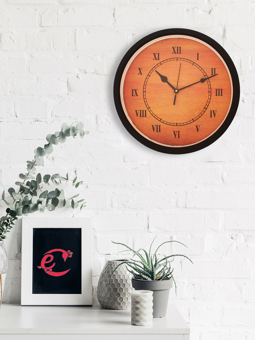 

eCraftIndia Black & Orange Round Textured Analogue Wall Clock
