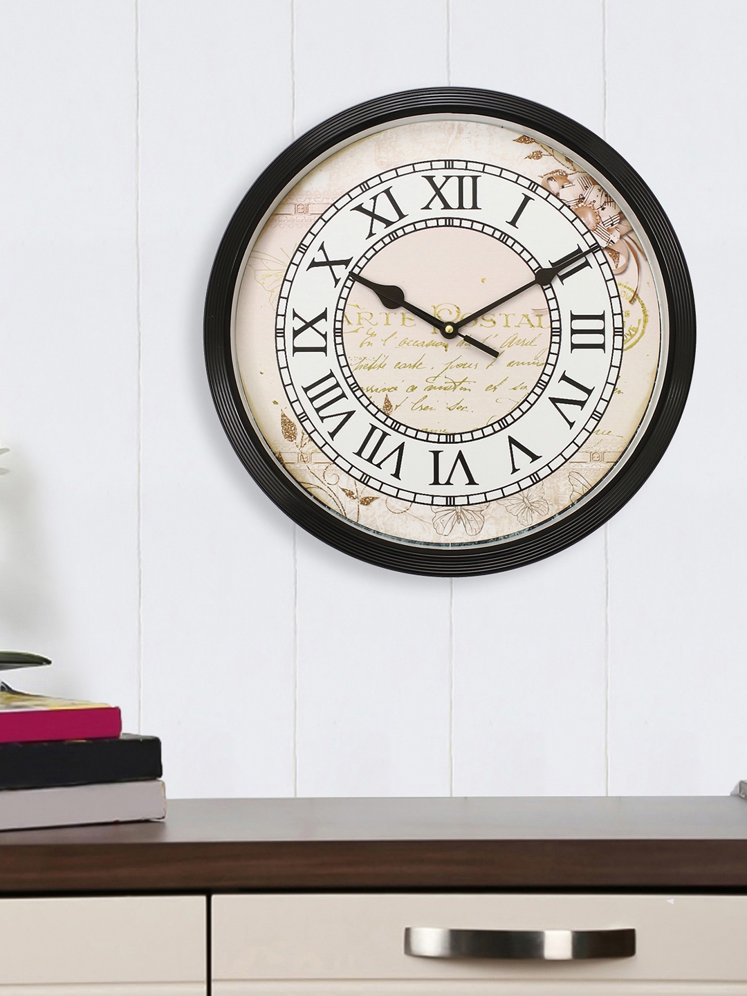 

eCraftIndia Black & White Round Printed Analogue Wall Clock