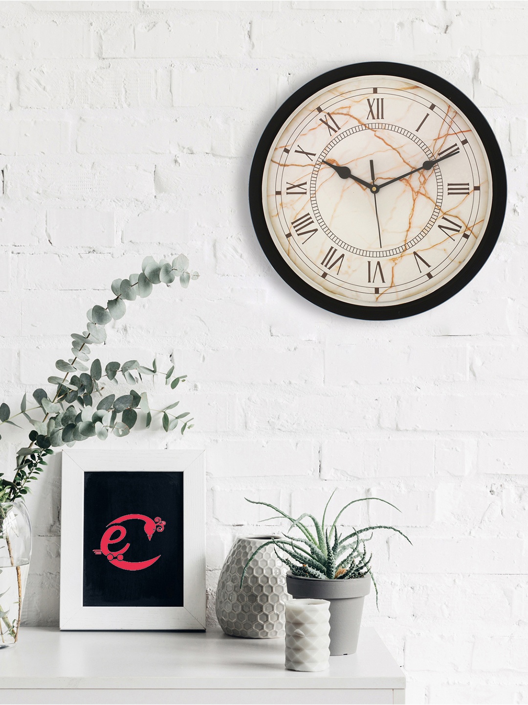 

eCraftIndia Black Analogue Wall Clock