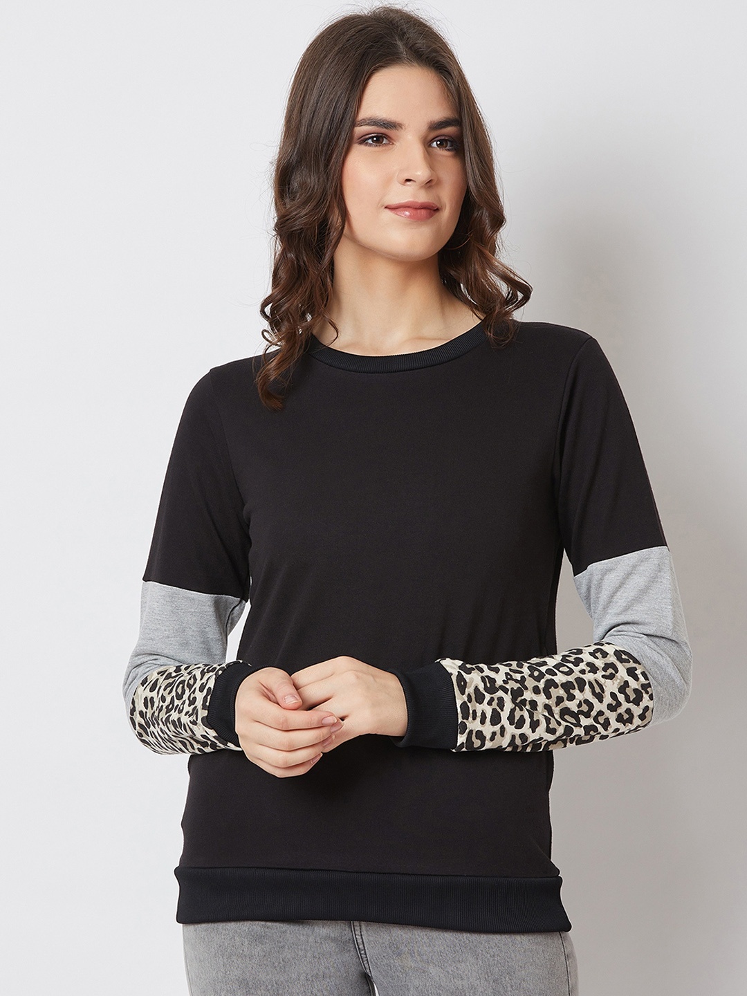 

Nun Women Black Solid Sweatshirt