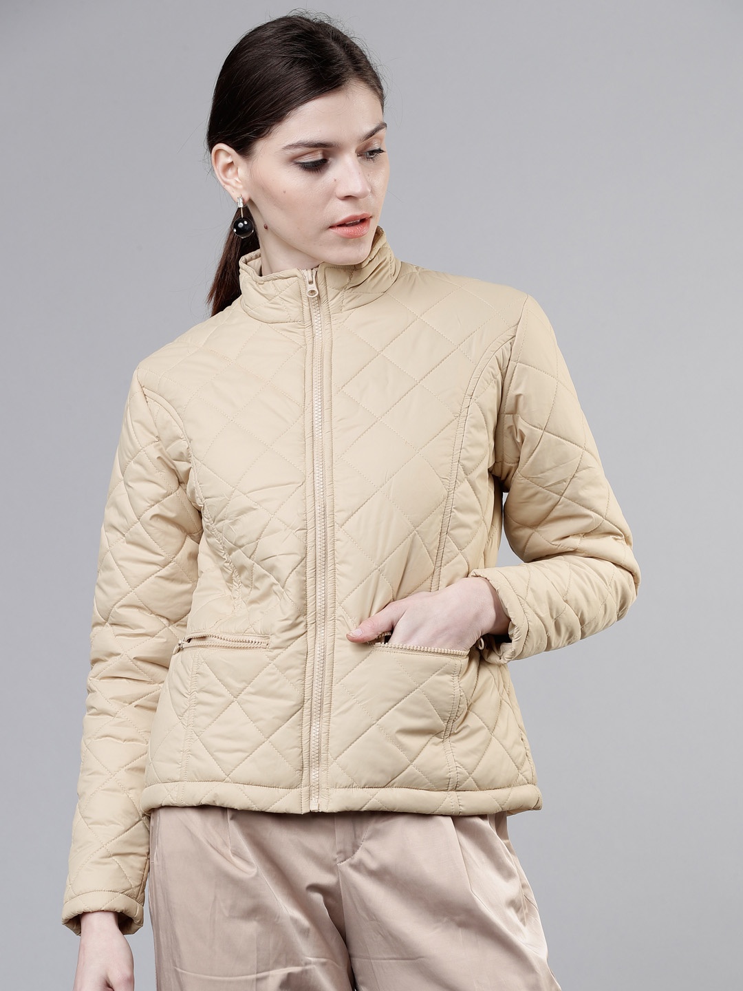 

Tokyo Talkies Women Beige Solid Quilted Jacket