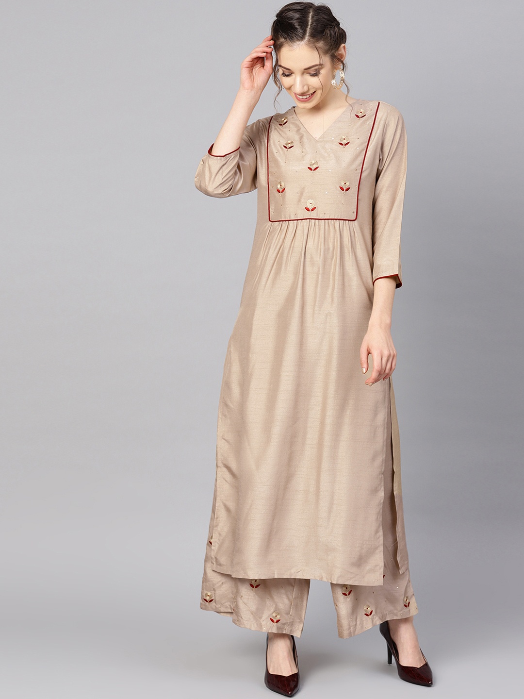 

Varanga Women Beige Embroidered Kurta with Palazzos