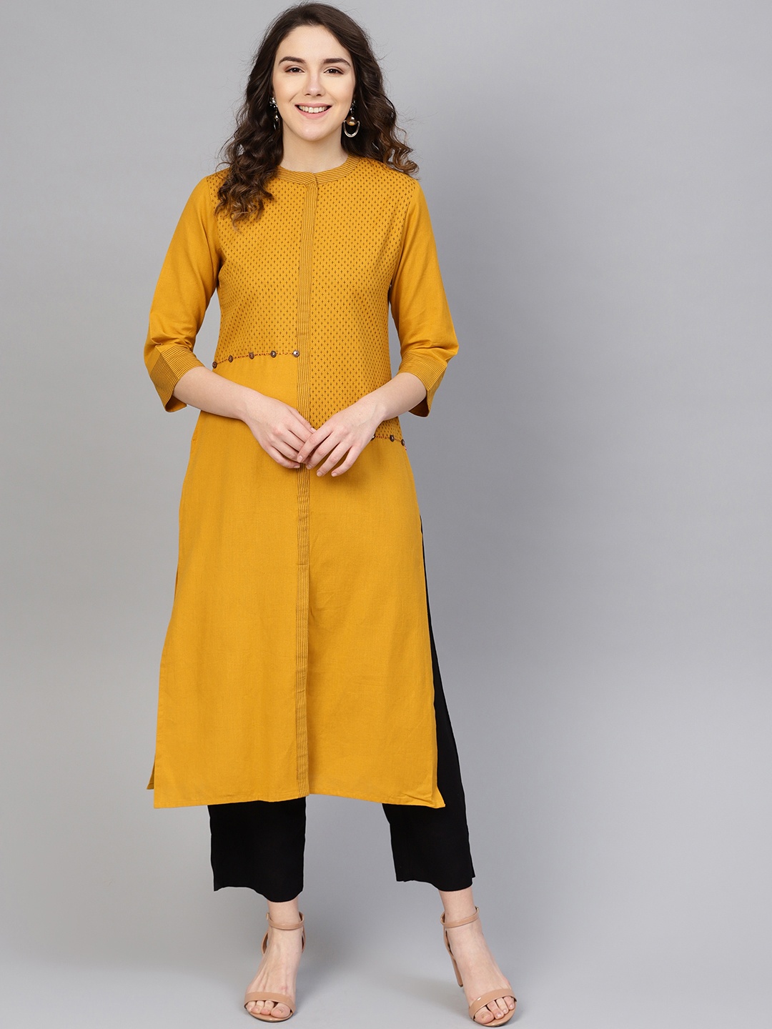 

Varanga Women Mustard Yellow & Black Printed Kurta with Trousers