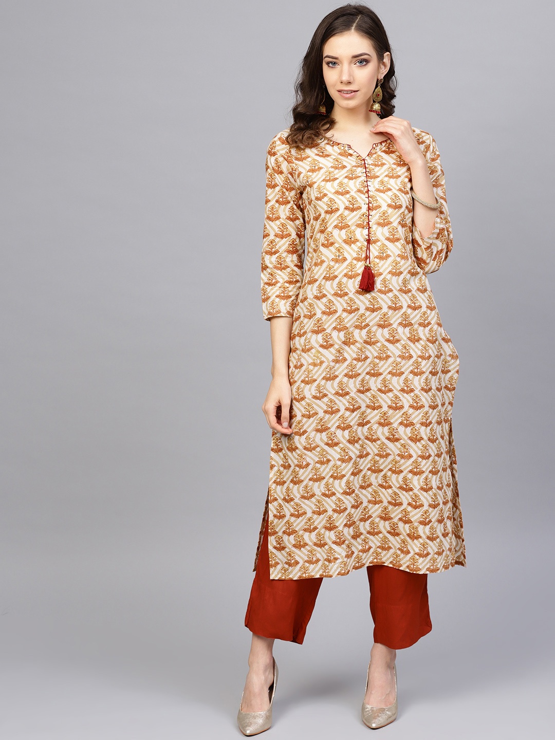 

Varanga Women Beige & Red Printed Kurta with Trousers