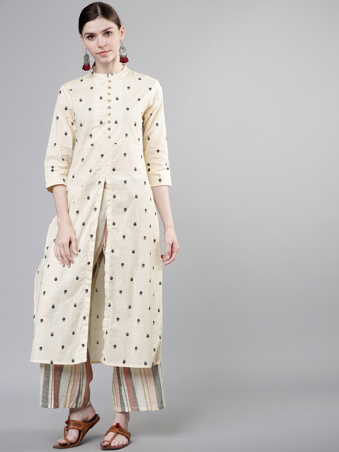

Vishudh Women Beige Printed Kurta with Palazzos