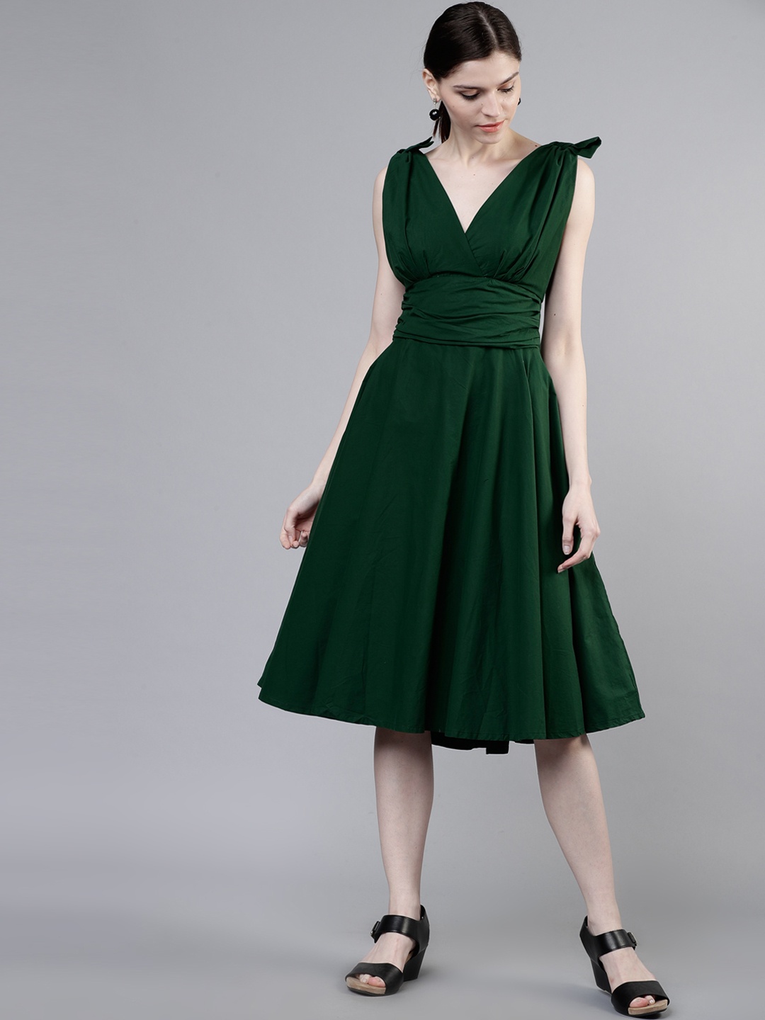 

Tokyo Talkies Women Green Solid Fit and Flare Dress