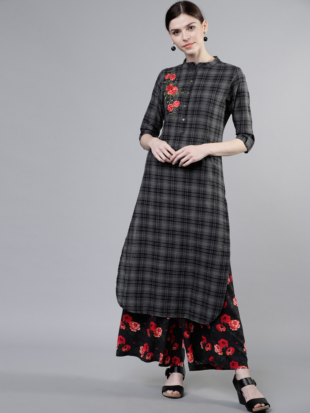 

Vishudh Women Black Printed Kurta with Palazzos