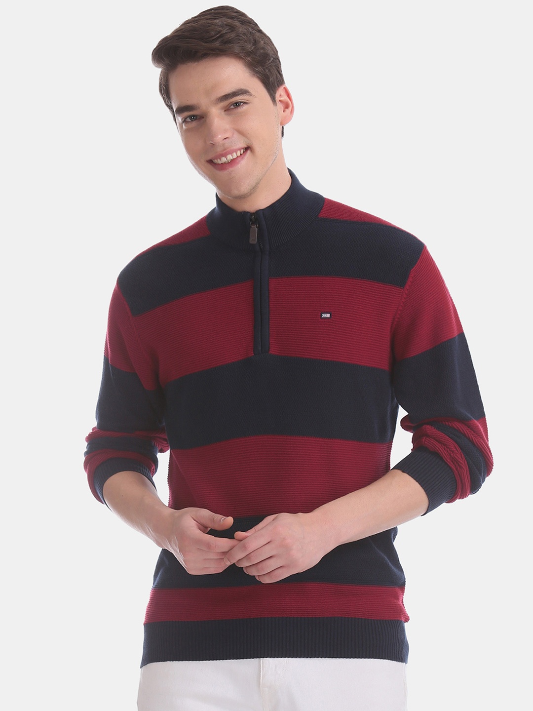 

Arrow Sport Men Red & Navy Blue Striped Pullover Sweater