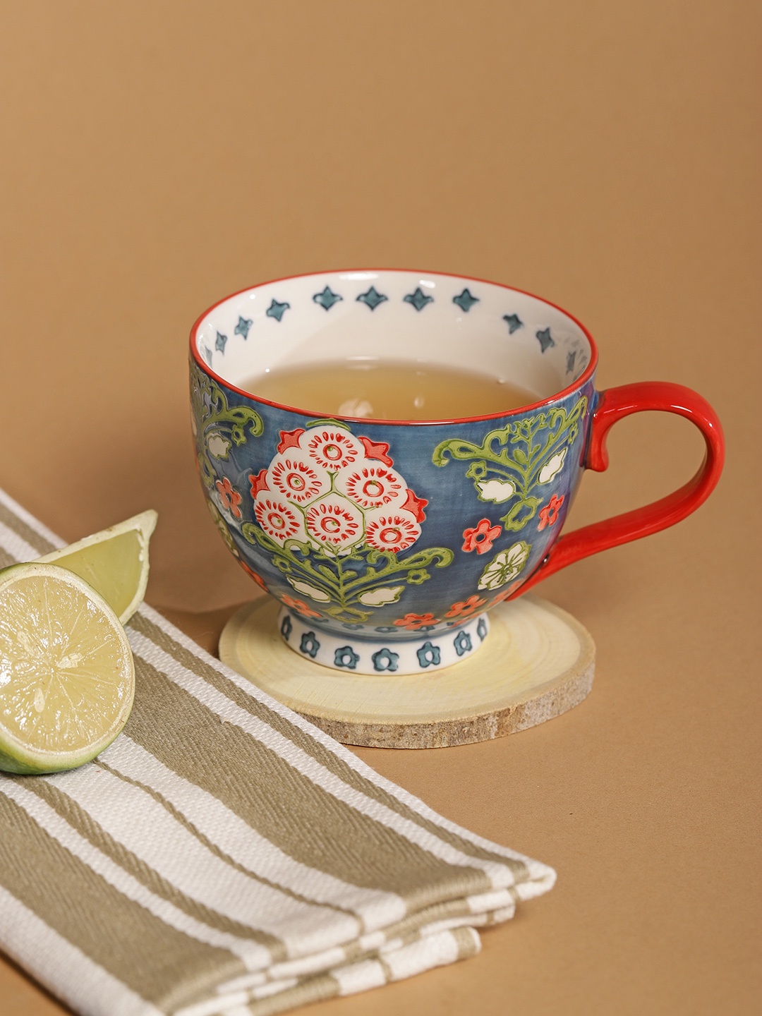 

Chumbak Blue & Green Printed Ceramic Cup 380 ml