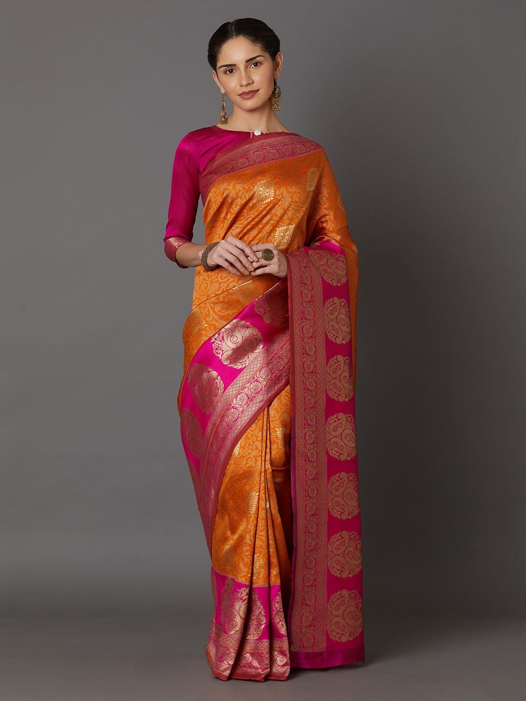 

Mitera Orange & Pink Silk Blend Woven Design Kanjeevaram Saree