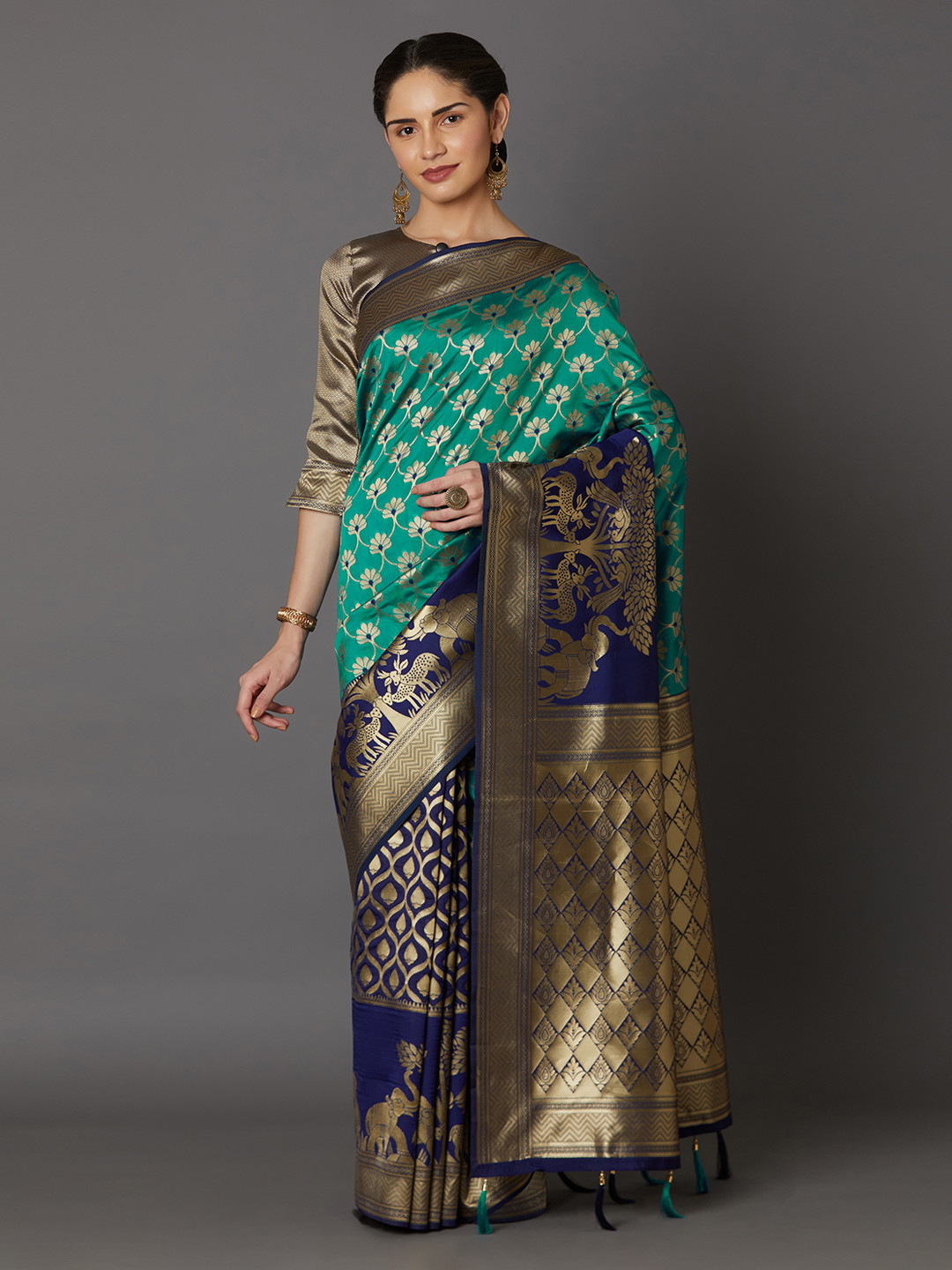 

Mitera Teal Green & Gold-Toned Silk Blend Woven Design Kanjeevaram Saree