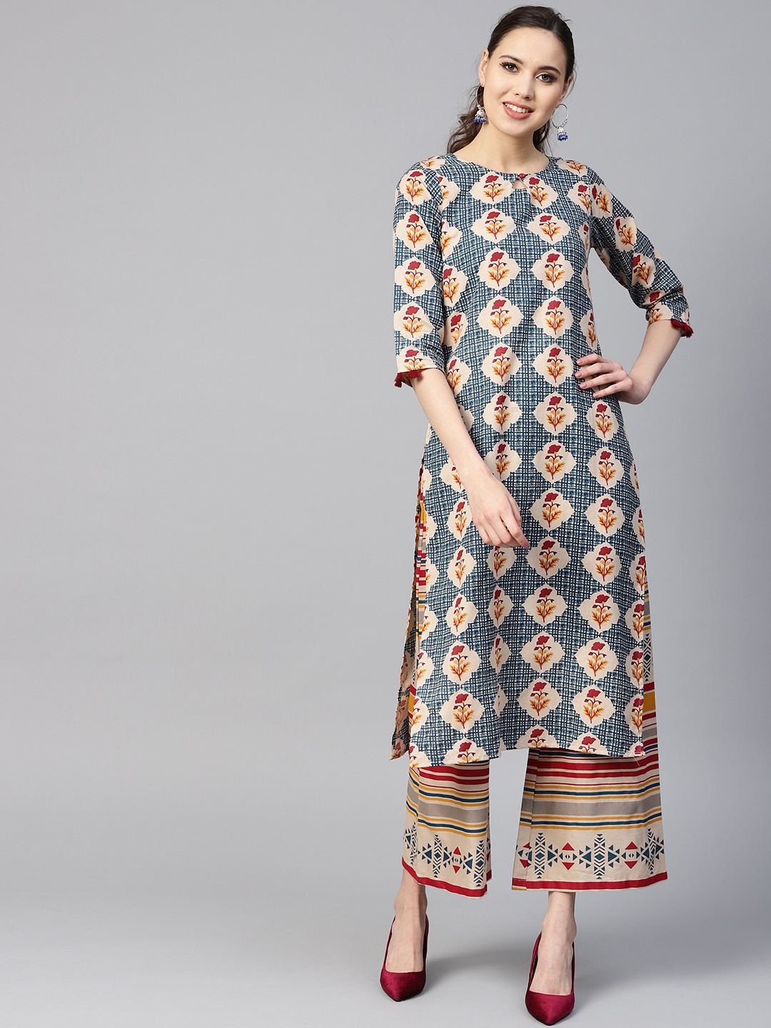 

Yuris Women Beige & Blue Printed Kurta with Palazzos
