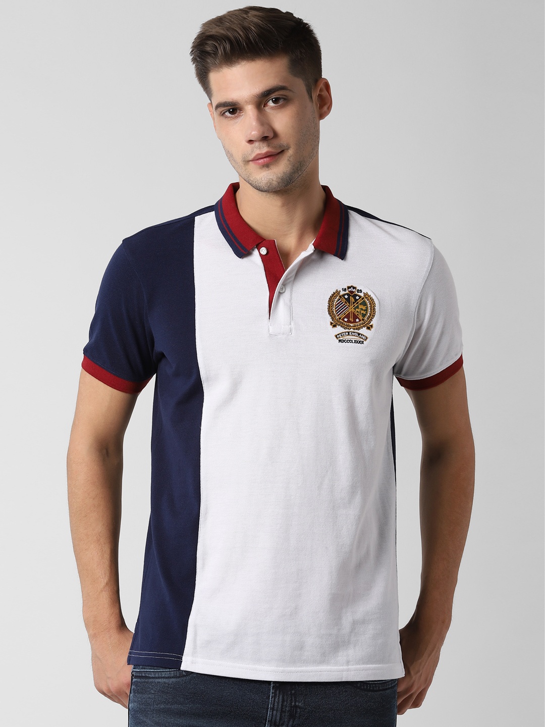 

Peter England Casuals Men White Colourblocked Polo Collar T-shirt