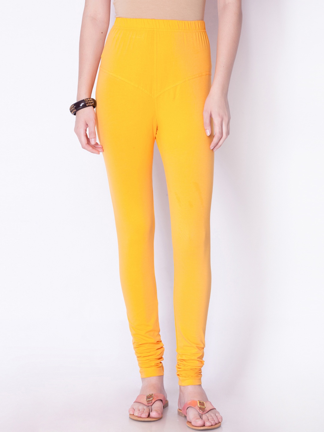 

Dollar Missy Women Yellow Solid Churidar Length Leggings