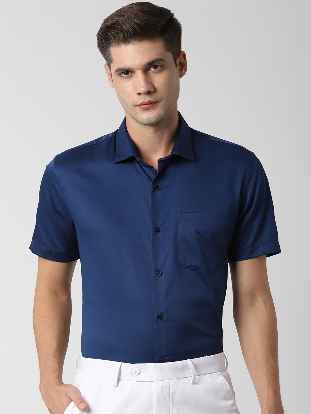

Peter England Men Navy Blue Slim Fit Solid Formal Shirt