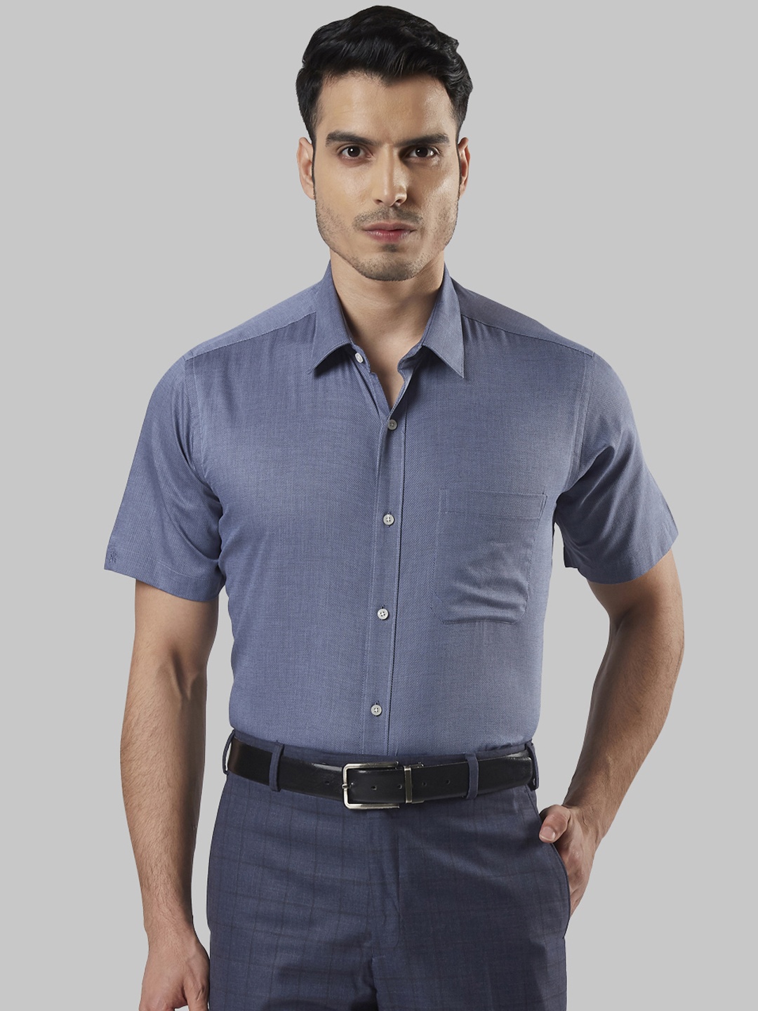 

Raymond Men Blue Regular Fit Self Design Formal Shirt