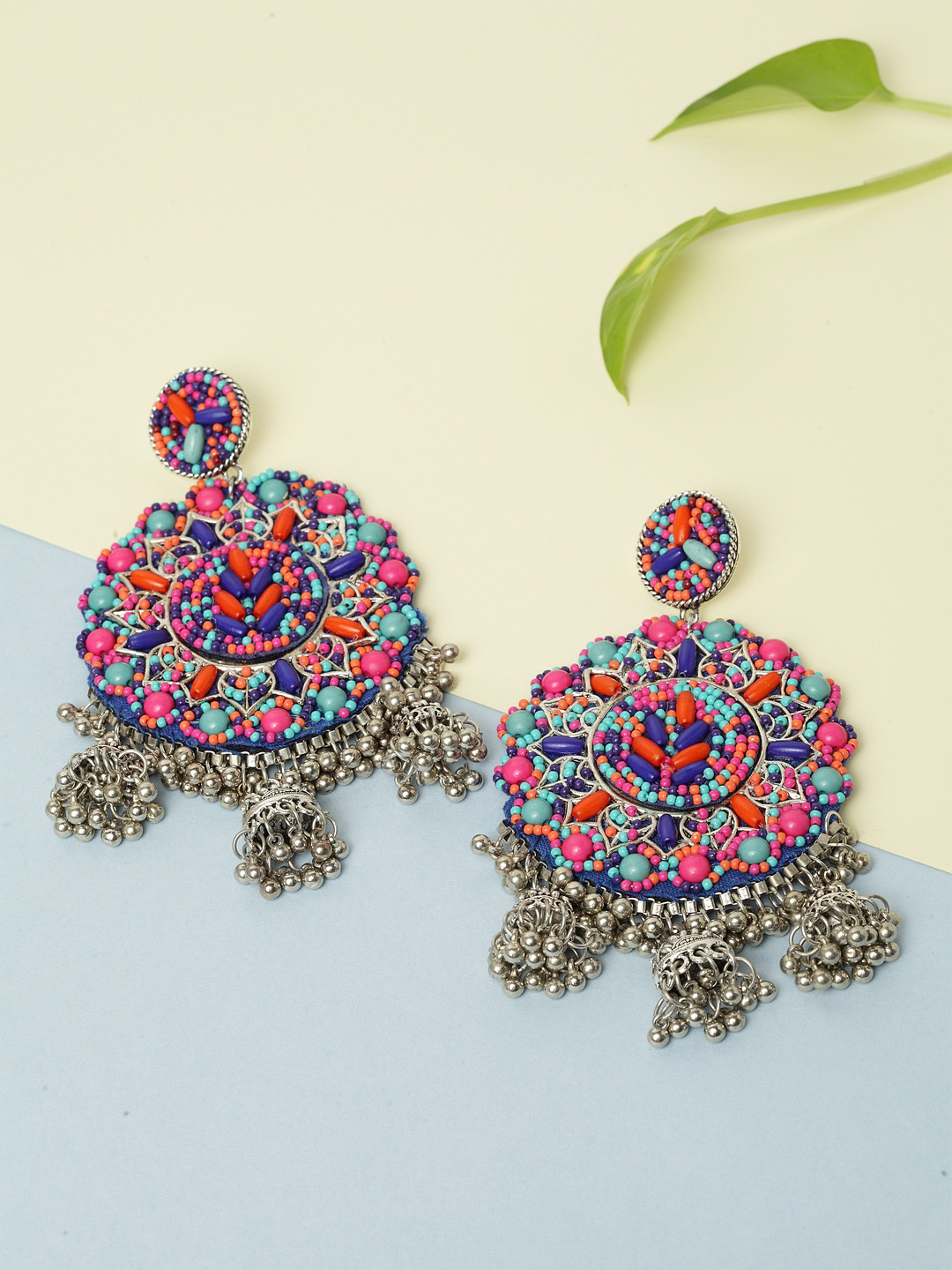 

Moedbuille Pink & Silver-Plated Crescent Shaped Handwoven Afghan Design Drop Earrings