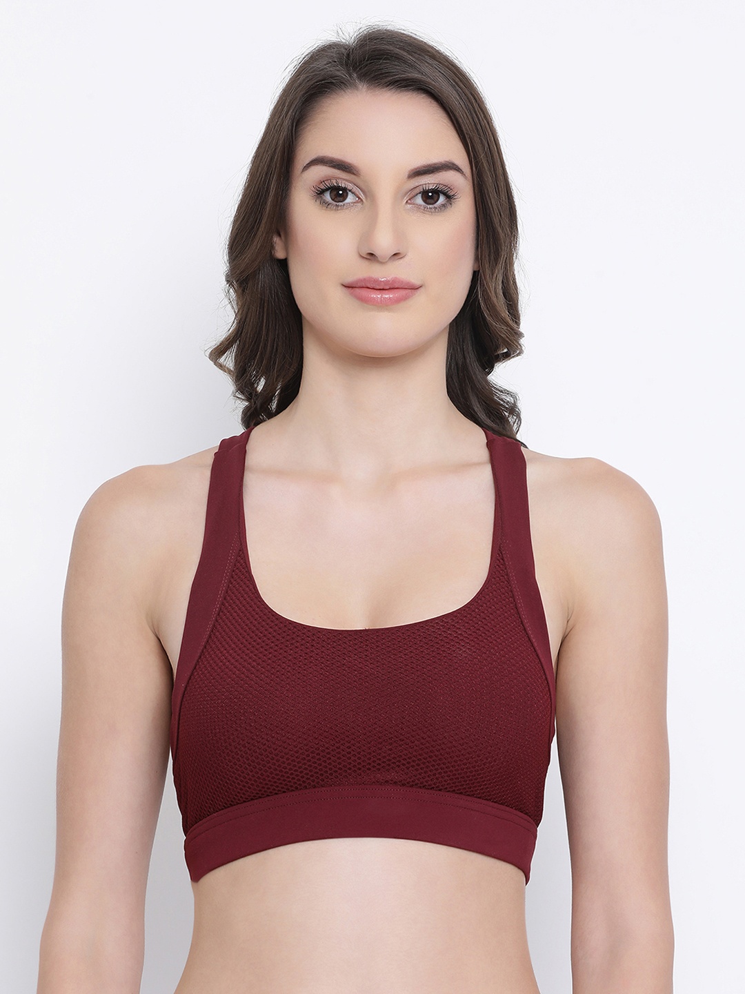 

Clovia Maroon Solid Padded Non-Wired Sports Bra BR1974P09