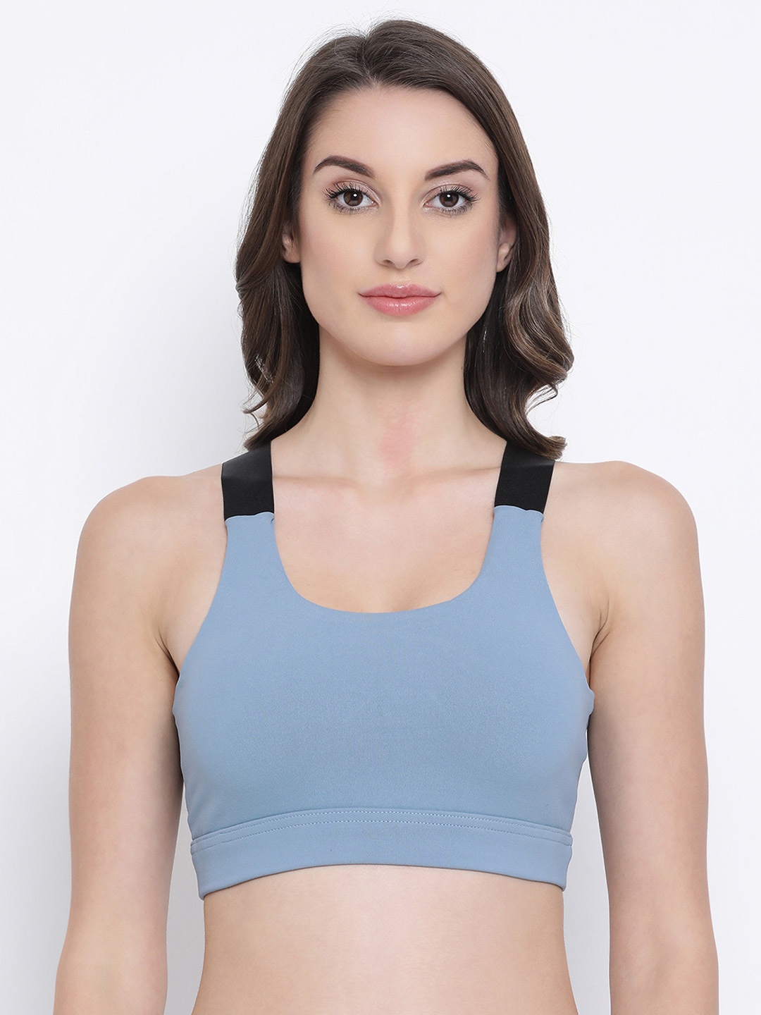 

Clovia Blue Solid Padded Non-Wired Sports Bra BR1972P0