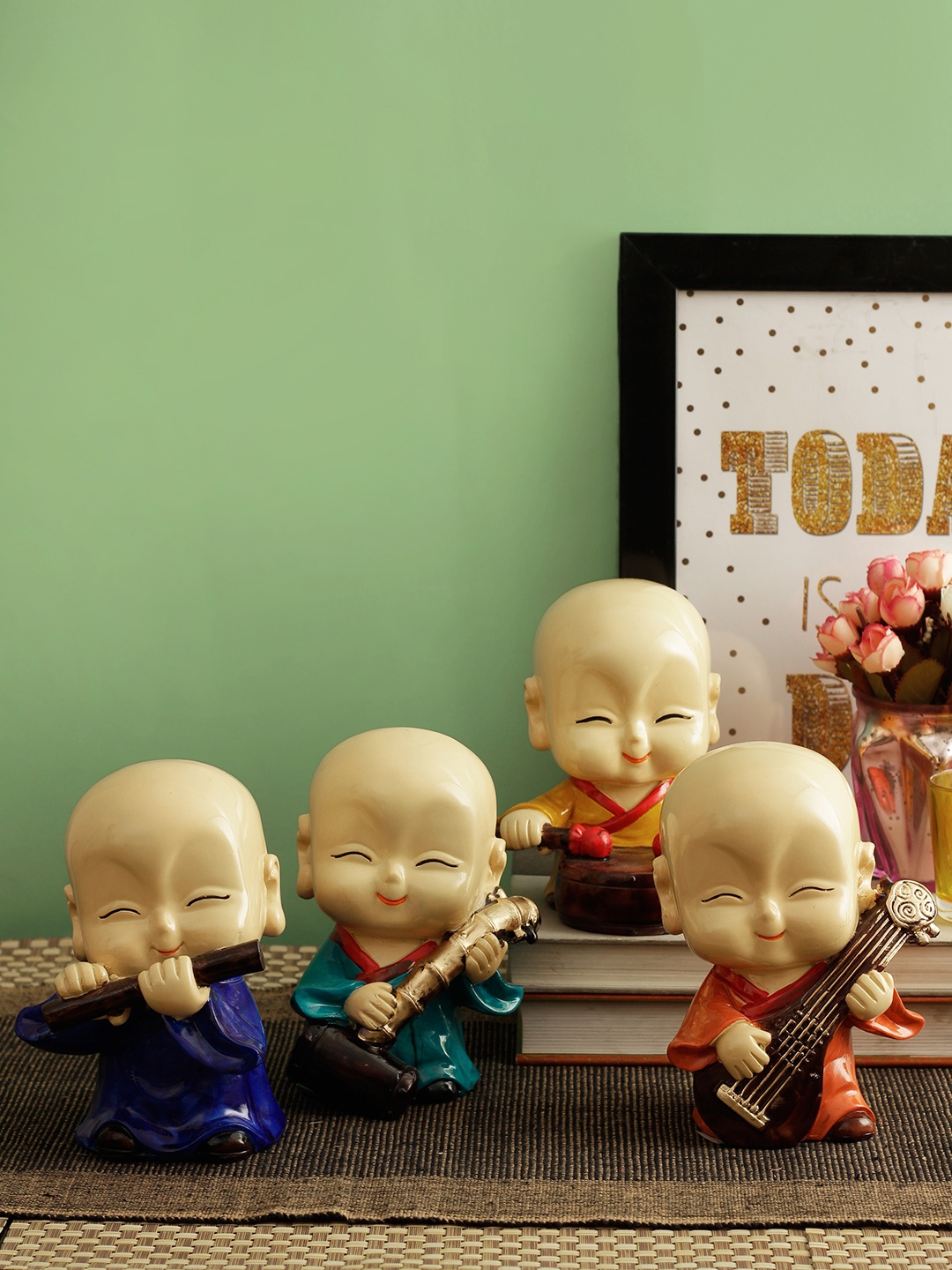 

TIED RIBBONS Set of 4 Cream-Coloured & Blue Cute Buddha Monks Playing Musical Instruments Showpieces