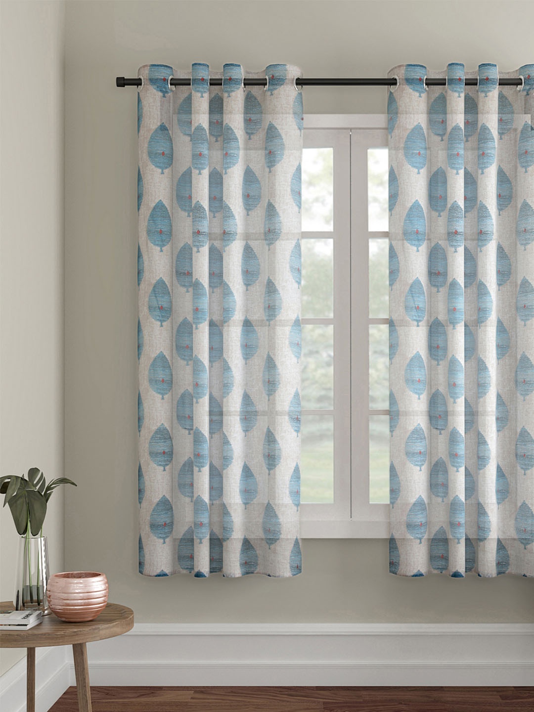 

Soumya Blue & Off-White Printed Lightweight Single Sheer Window Curtain