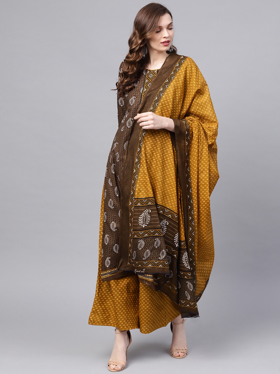 

Ishin Women Brown & Yellow Printed Kurti with Palazzos & Dupatta