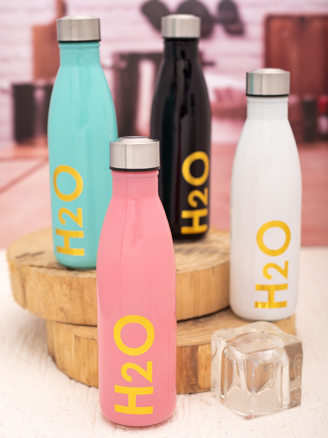 

White Gold Set of 4 Glass Bottles 650ml each, Multi