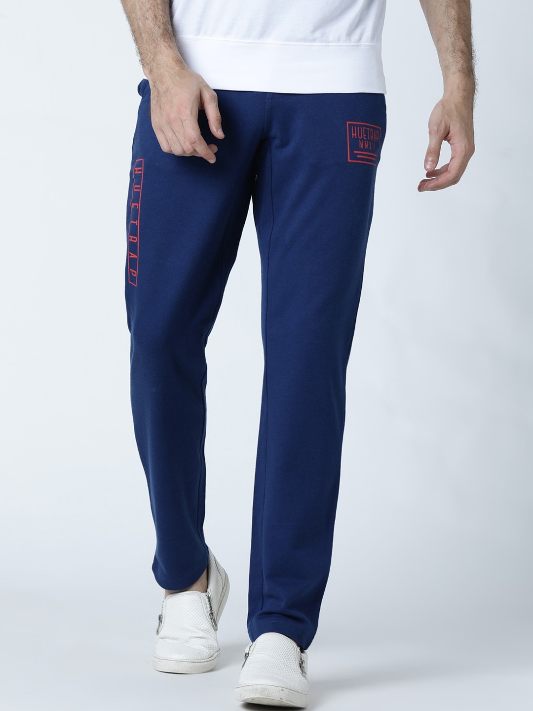 

Huetrap Men Blue Solid Straight Fit Track Pants