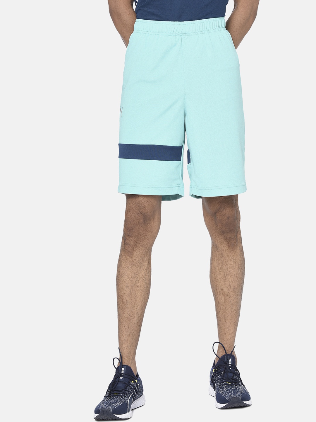 

Puma Men Biscay Green-Gibraltar Solid Regular Fit Sports Shorts
