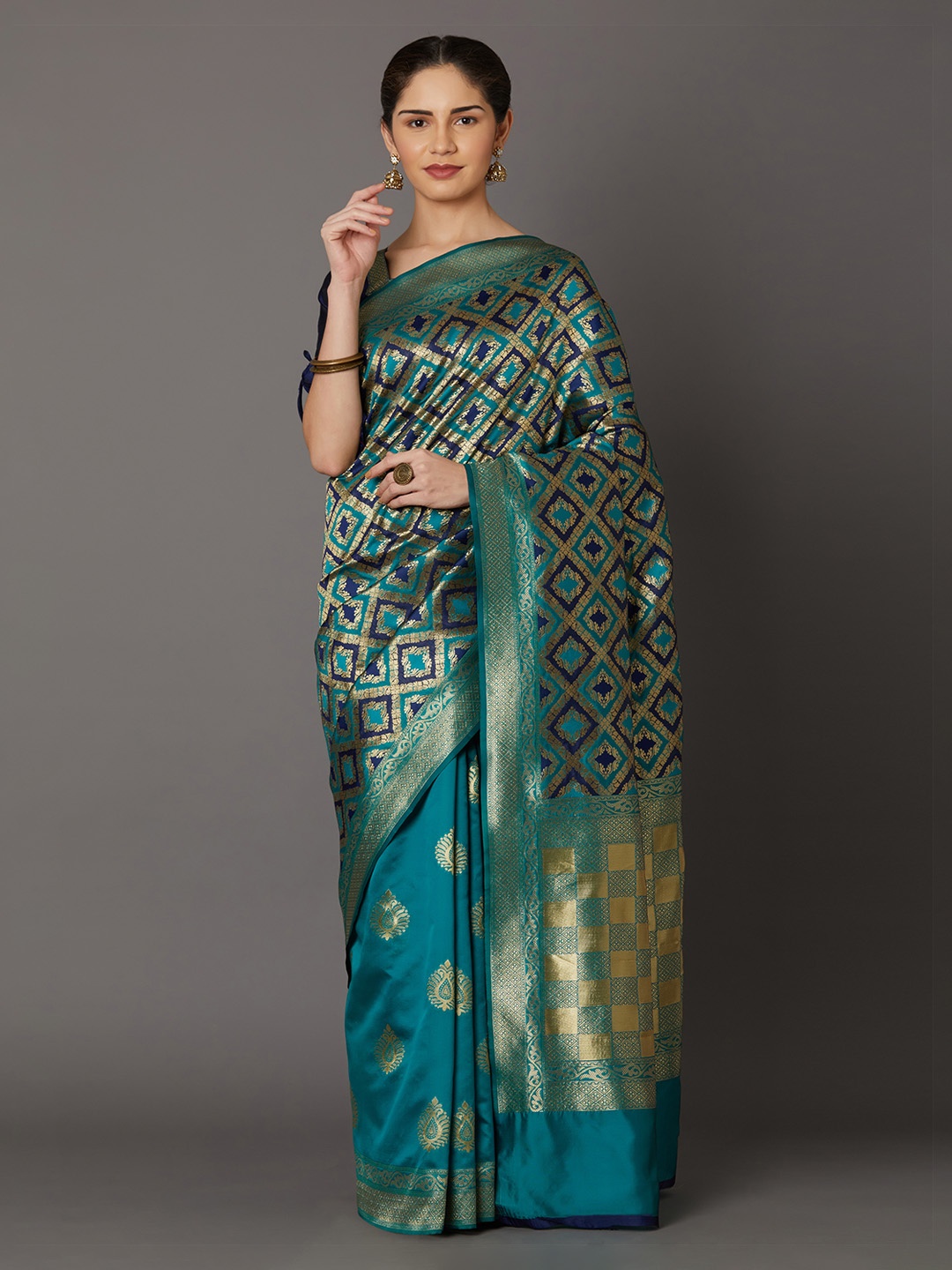 

Mitera Teal Green Silk Blend Woven Design Kanjeevaram Saree