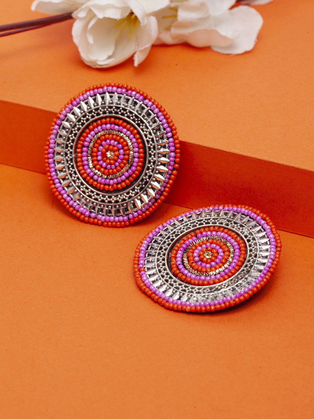 

Moedbuille Brass Plated Pink & Silver-Toned Handcrafted Circular Jhumkas