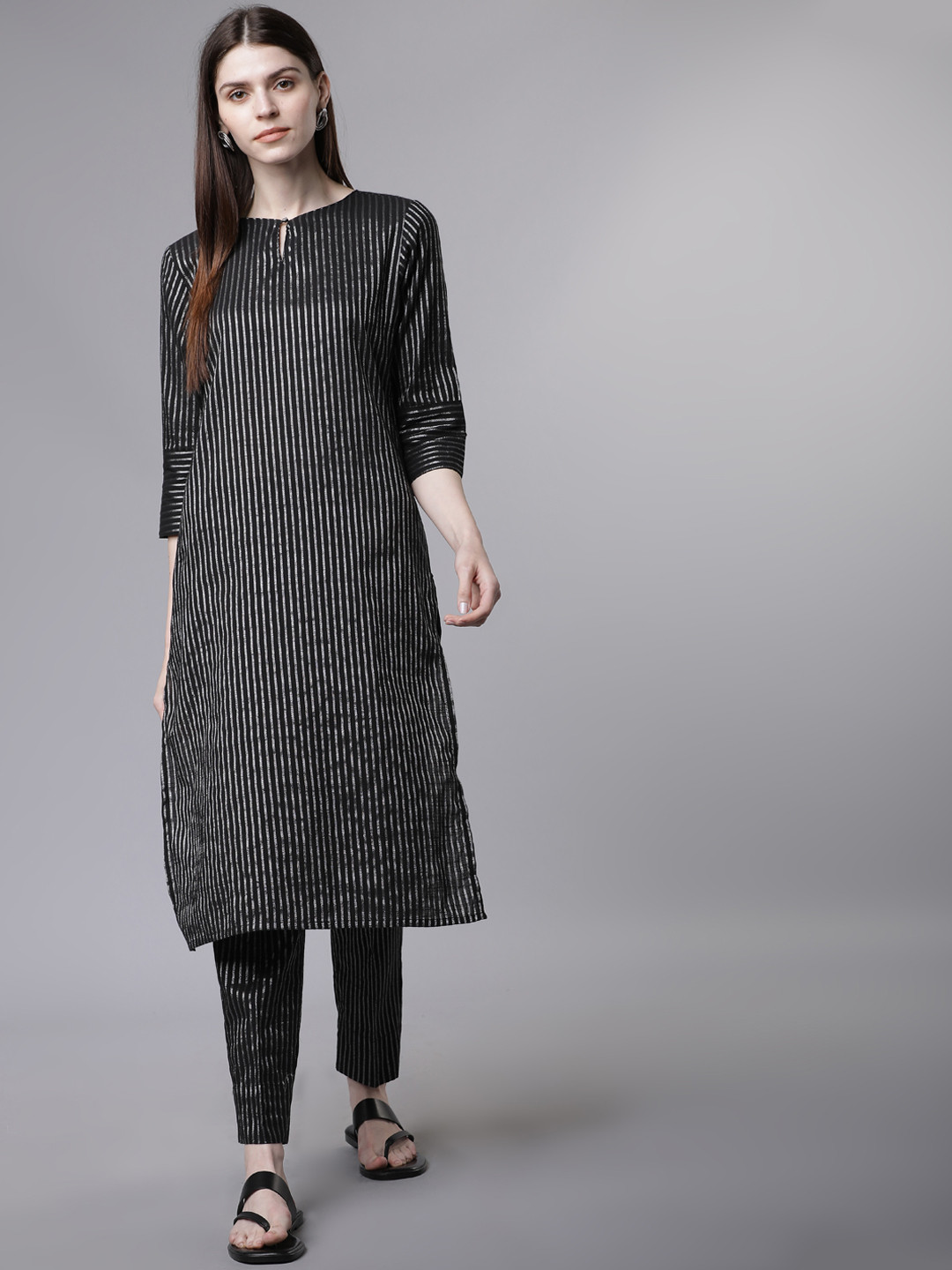 

Vishudh Women Black & Silver-Toned Printed Kurta with Trousers